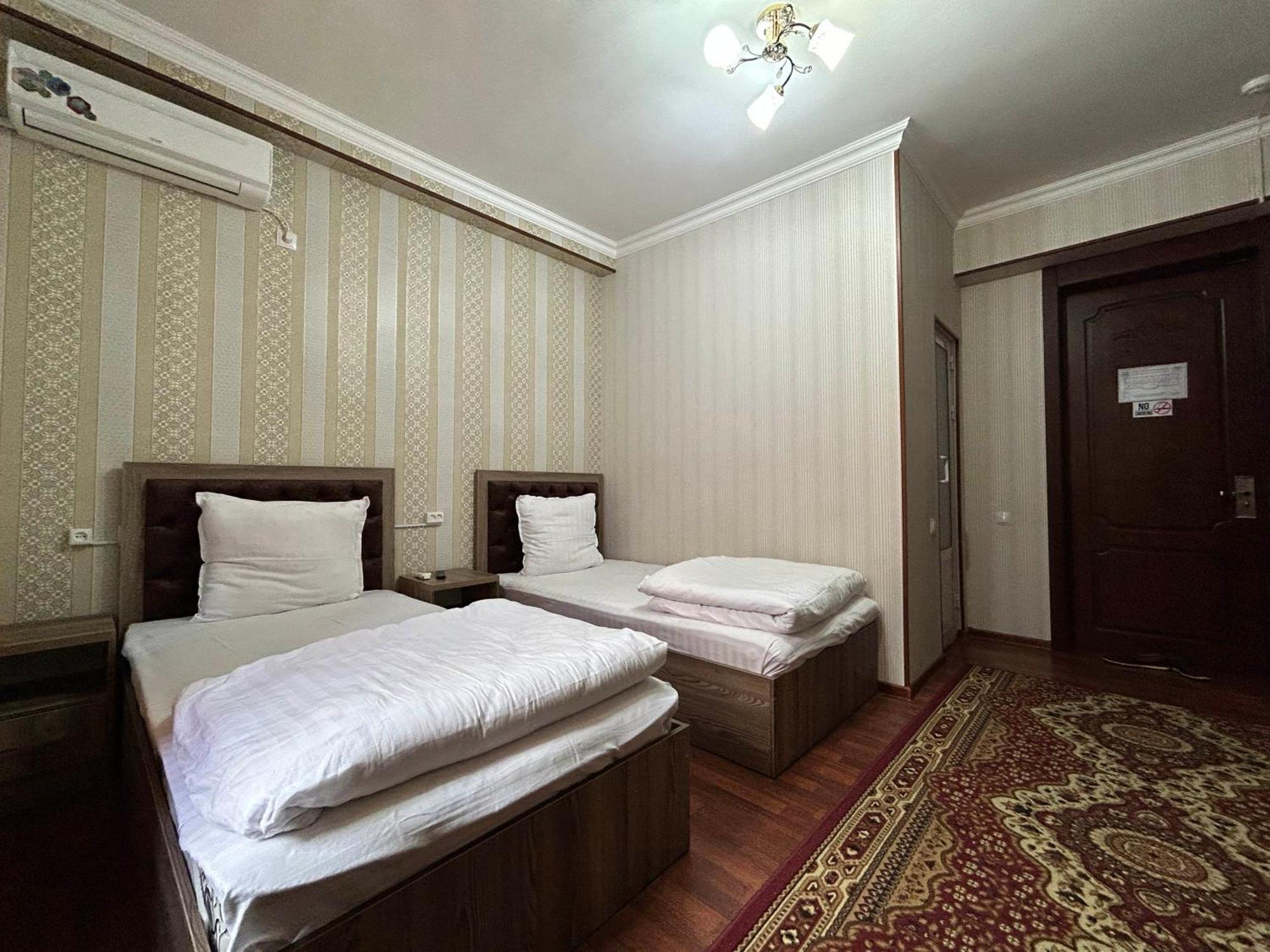 Hotel Ishonch Samarkand Quarto foto